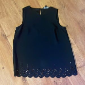 Black sleeveless top with scallop cut out detail